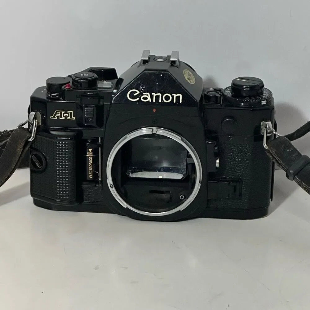 Vintage Canon A-1 Black 35 mm SLR with Strap/ Body Only